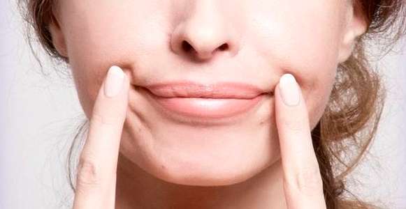Для устранения эффекта опущенных углов рта