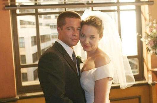Питт и Джоли пошли под венец, уже находясь в браке. Фото со съемок фильма Мистер и миссис Смит