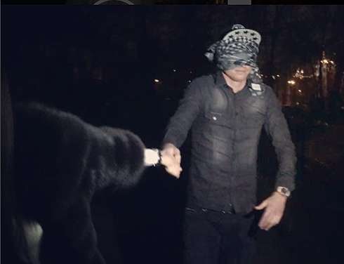 На футбльное поле именинника привели с завязанными глазами