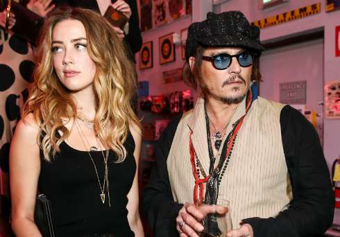 Эмбер Херд и Джонни Депп развелись