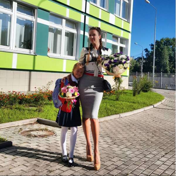 Первая жена спортсмена Оксана Пономаренко и их общая дочь Ангелина