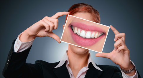 От чего болят зубы и десны