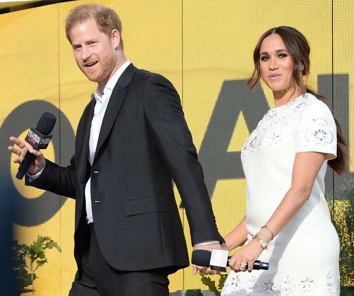 Меган Маркл и принц Гарри во время мероприятия