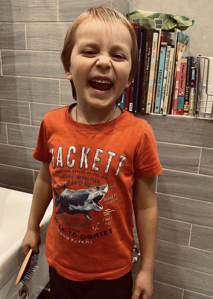 Сын Михаил с новой прической