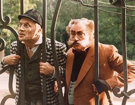 В образе Коровьева в фильме «Мастер и Маргарита». 