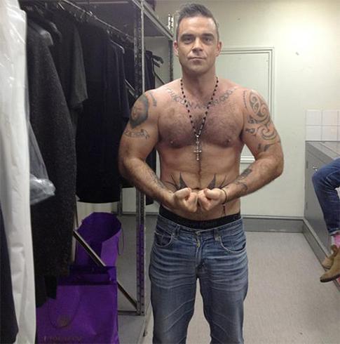 Робби Уиллиямс качает мускулы и ждет рождения дочери