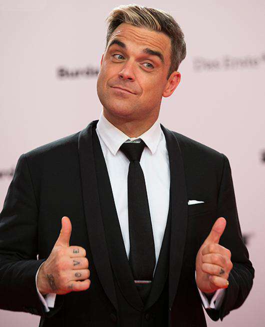 Робби Уильямс. Фото: AP Images.