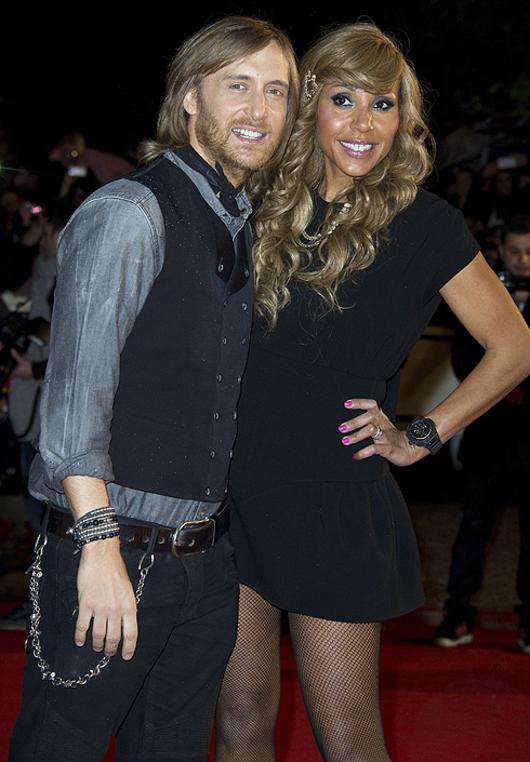 Дэвид Гетта с женой. Фото: Sipa Press/Fotodom.ru.