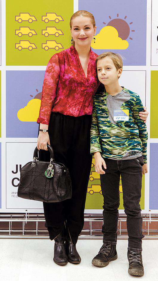 Ольга Будина с сыном. Фото: BMW Group.