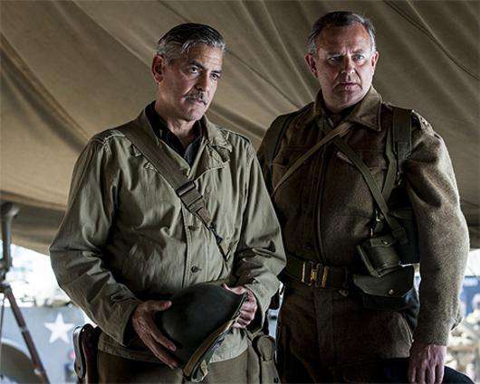 Джордж Клуни и Хью Бонневиль познакомились на картины «Охотники за сокровищами». Кадр из фильма.