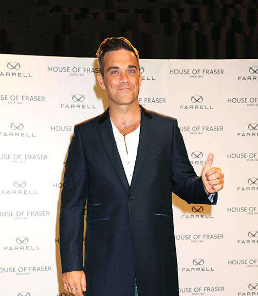 Робби Уильямс. Фото: Rex Features/Fotodom.ru.