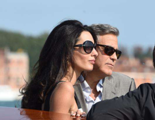 Папарацци удалось заснять проезд Клуни и Аламуддин по Гранд-каналу. Фото: All Over Press. 