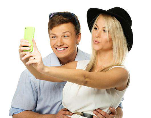 Иногда новые телефоны вызывают у девушек больший трепет, чем живые люди. Фото: Lori.ru.