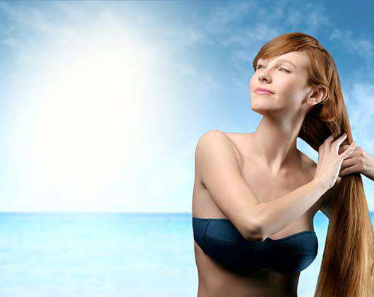 Летом волосы нуждаются в особой защите. Фото: Fotolia/PhotoXPress.ru.