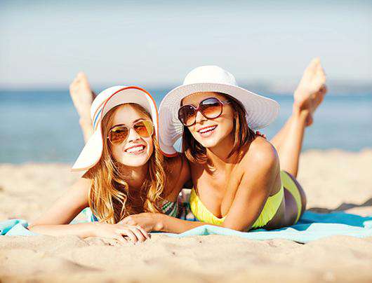 Как защитить кожу во время загара? Фото: Lori.ru.