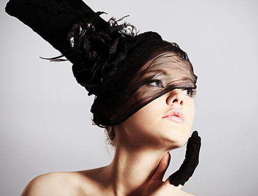 Перчатки и шляпа сделают изысканным любой образ. Фото: Fotolia/PhotoXPress.ru.