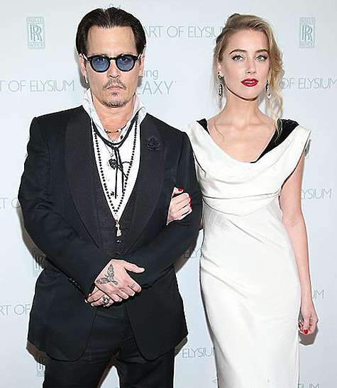 Роман с нынешней супругой Деппа Эмбер Херд завязался на съемках картины «Ромовый дневник». Фото: AP Images.