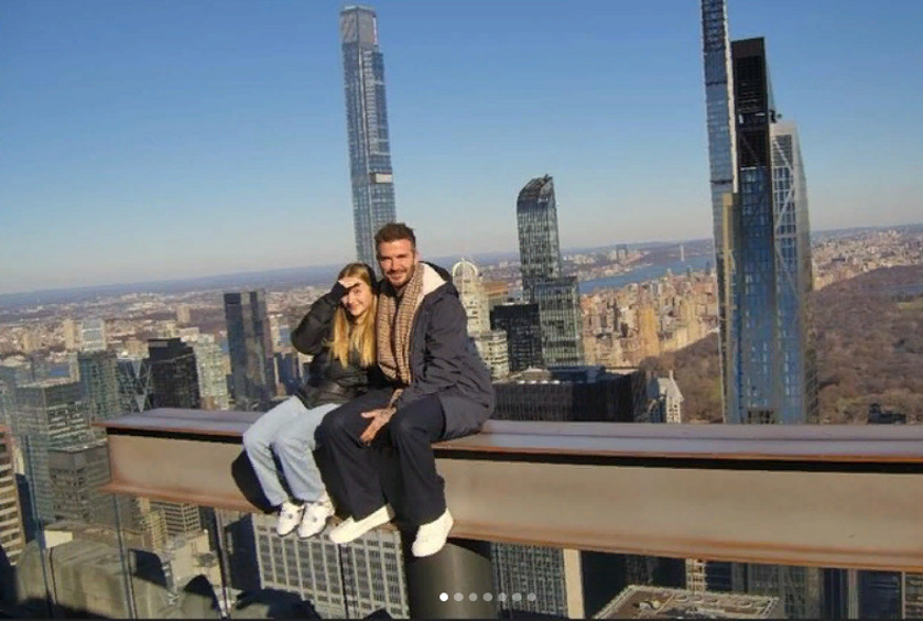 Дэвид Бекхэм с дочерью на небескребе