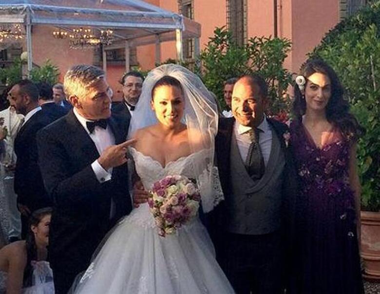 Джордж Клуни и Амаль Аламуддин на свадьбе друзей. Фото: Twitter.com.