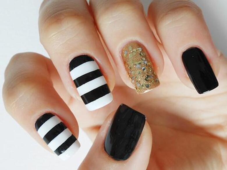 Летом будет в моде яркий маникюр.