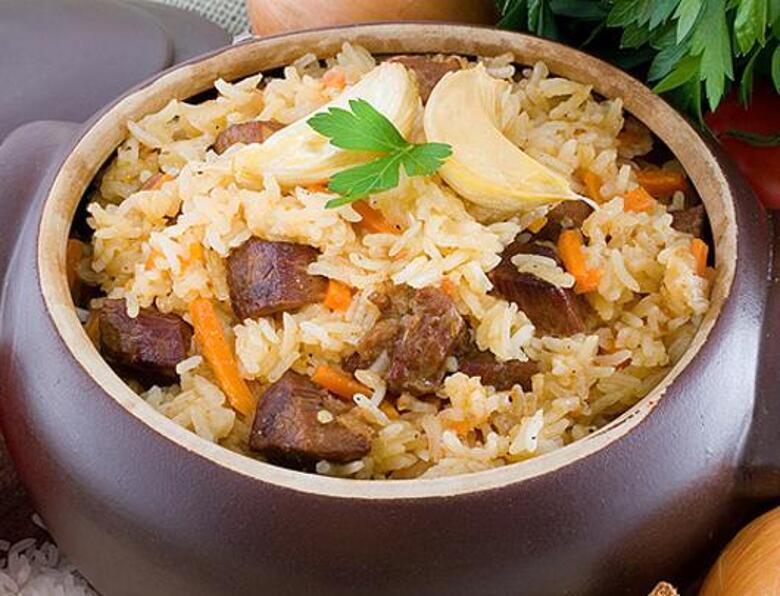 Для приготовления правильного плова нужно знать несколько секретов. Фото: Fotolia/PhotoXPress.ru.