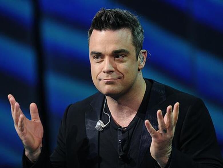 Робби Уильямс. Фото: Rex Features.com.